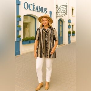 Short sleeve tunic sweater pit 19” l31”